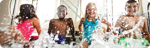 Children having fun in the swimming pool